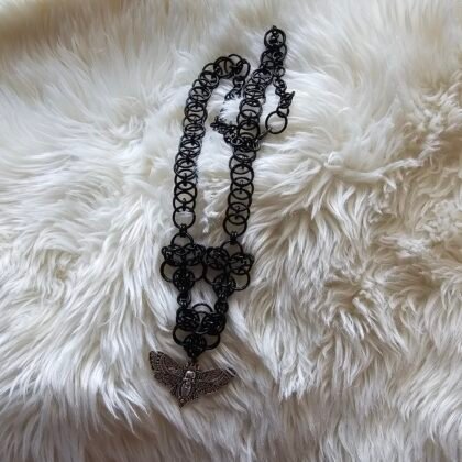 black moth helm necklace